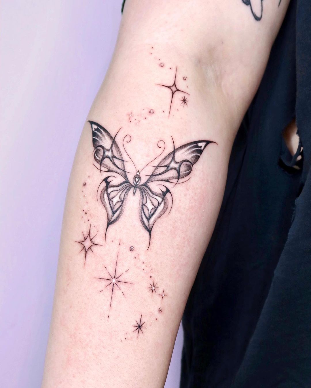 Farfalla e stelle tattoo